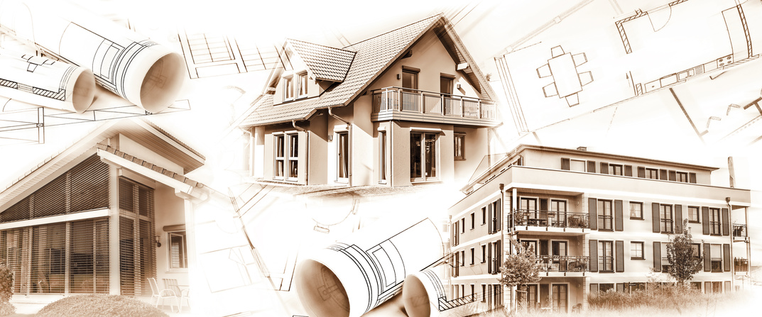 Neubauten und Baupläne als Symbol für die Baubranche oder Immobilienbranche.